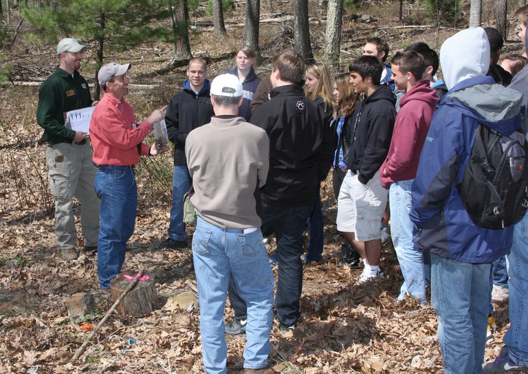High school youth participating in Deer and Forest Ecology field activity