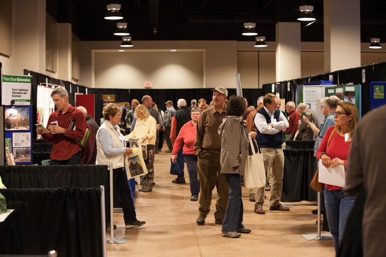 Guests browsing the Conference exhibit hall
