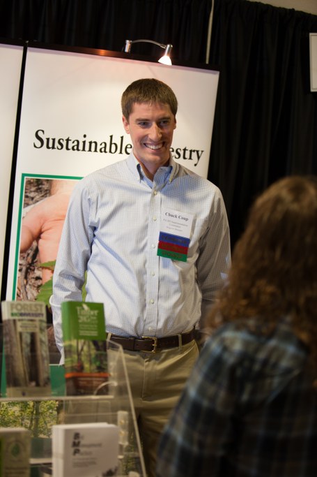 Chuck Coup, SFI Conference representative, talking with guests