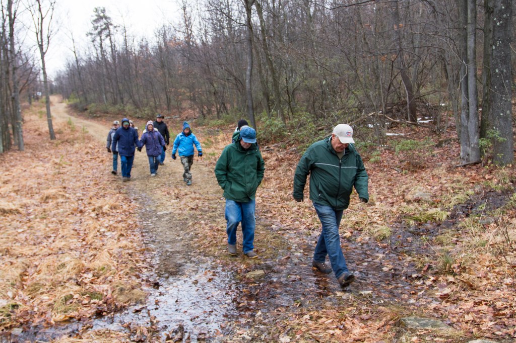 Tour participants walking to the first tour site.