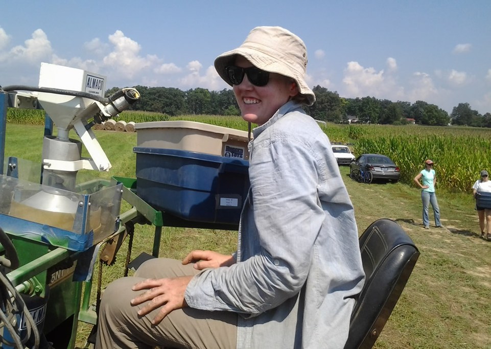 We work with an excellent farm crew to manage our cropping systems experiments. In crunch times, graduate students, undergrads, postdocs, PIs, and lab technicians pitch in too.  Here Brosi (our Lab Manager/Tech) is operating the “cone seeder” we use to plant biodiverse cover crop mixtures.