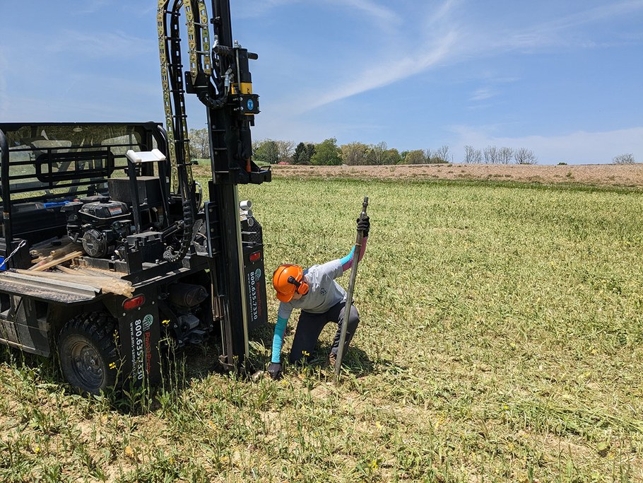 As part of our effort to understand how different cover crop species are able to reduce nitrogen leaching from agricultural soils, we take deep soil cores to evaluate nitrogen content in the soil profile up to 80 cm below the surface. In this photo, Ph.D. student Madeline Luthard is operating the deep soil corer in one of the cover crop plots before corn is planted in early summer.
